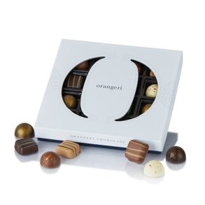 Cocoture - 144g 16 stk fyldt chokolade og marcipanstykker i orangeri �ske med bl� bund 