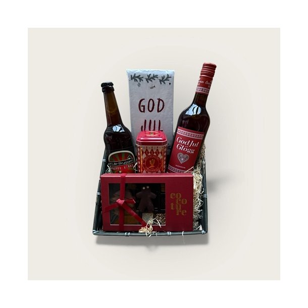 God jul gavekurv med glgg, dsel og lkkerier. Pakket i bastkurv