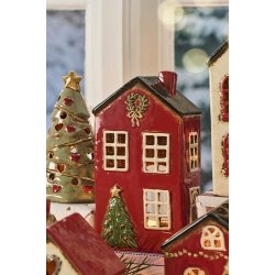 Ib Laursen Hus til fyrfadslys Stillenat juletr foran huset