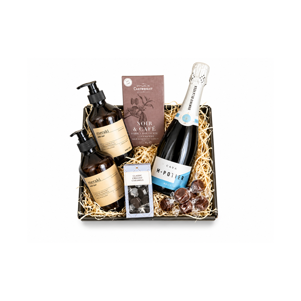 Stilfuld gavekurv med bobler, meraki, chokolade og karamel