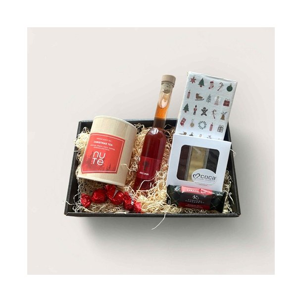 Julekurv med te, julelikør, servietter og chokolade